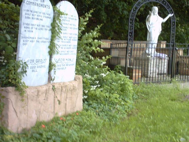 statue of Jesus with outstretched arms.